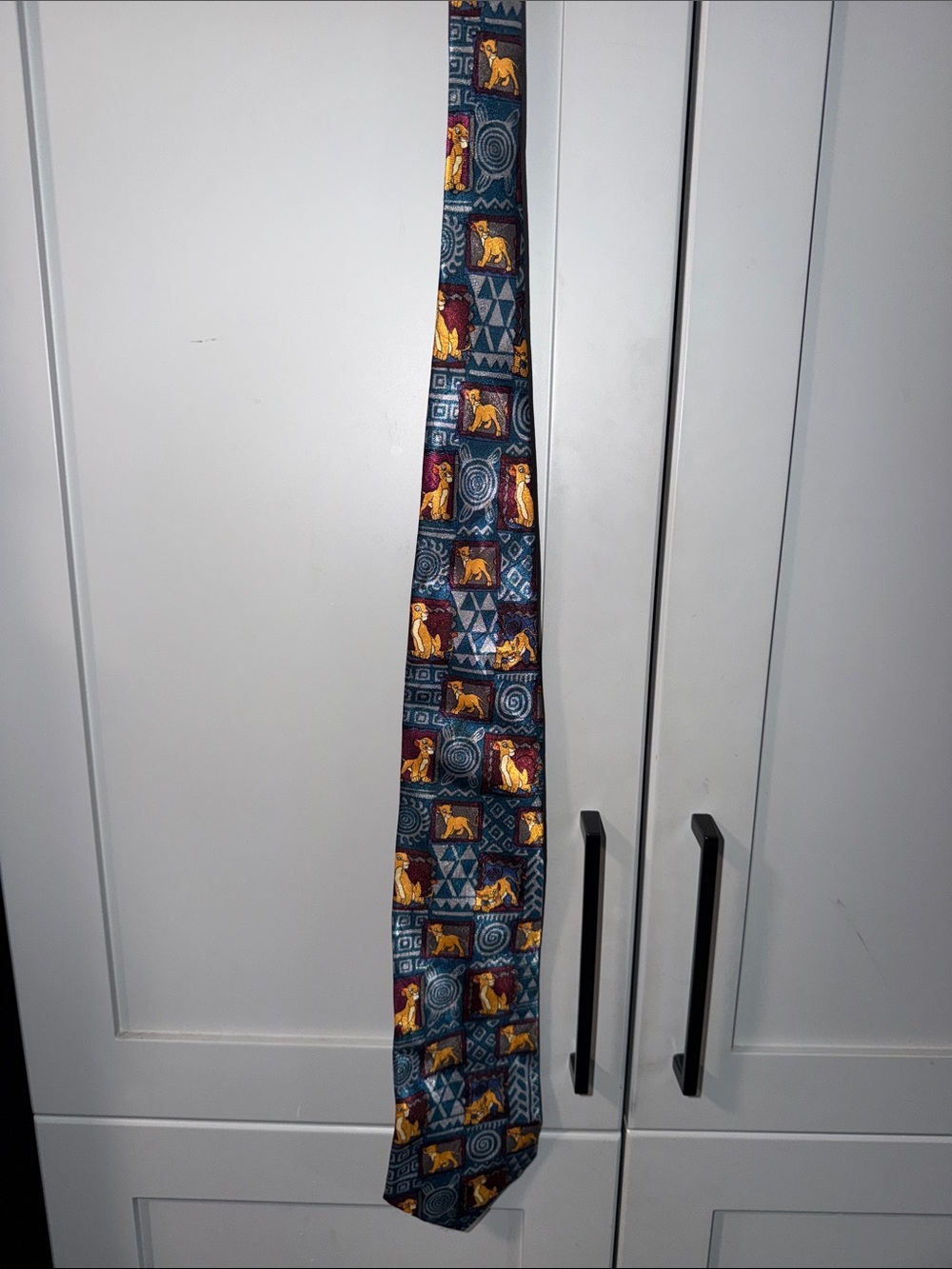 Blue Patterned Tie with Gold and Burgundy Animal Motif